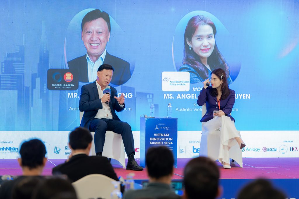 Francis Wong and Angela Ngan Nguyen discussing Vietnam's innovation potential at the Vietnam Innovation Summit 2024.