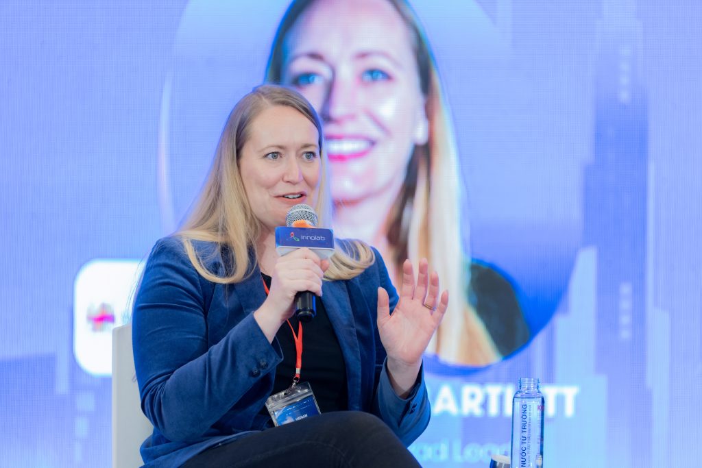 Ms. Harriet Bartlett presenting on Australia’s government-backed support for startups in AI, cybersecurity, and agriculture.